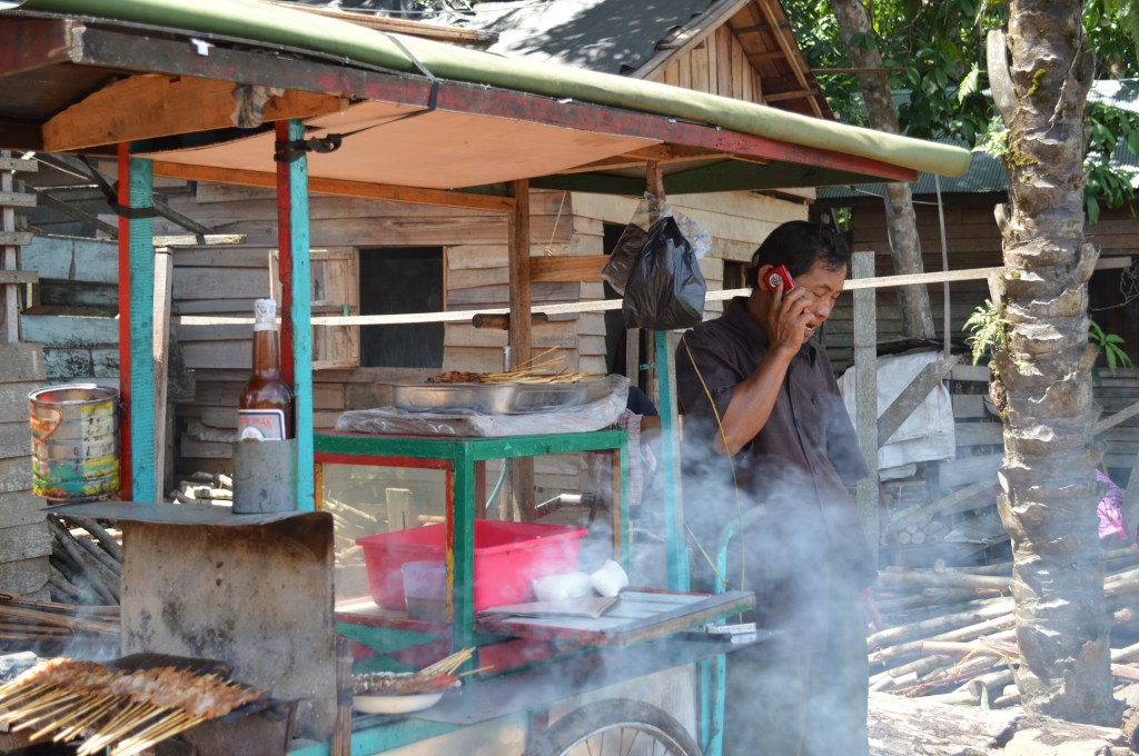 A food stand serves the sawmill's workers