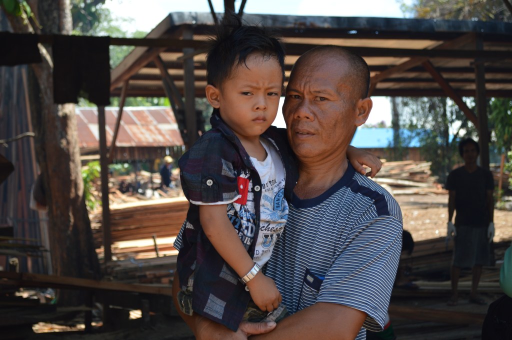 Families at a Borneo sawmill